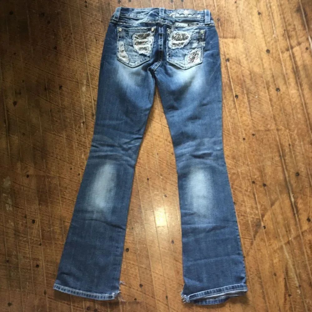 Miss Me 27 shimmery blingy patch western boot cut distressed jeans